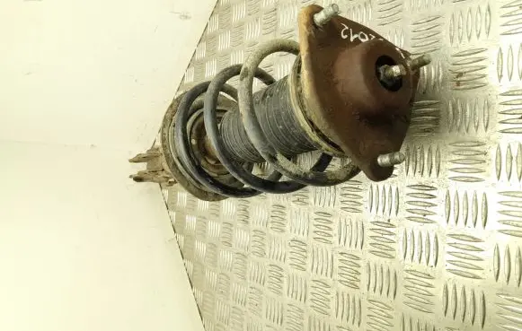 KIA Sportage Front shock absorber with coil spring 546503U000