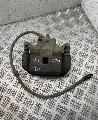 Nissan Juke I F15 Front brake caliper