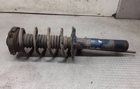 Seat Leon (1P) Front shock absorber with coil spring 