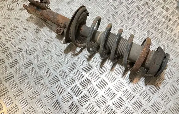 Suzuki Swift I Front shock absorber/damper 4160162J11