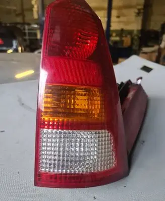 Ford Focus Tail light bulb cover holder XS4X13N004EC