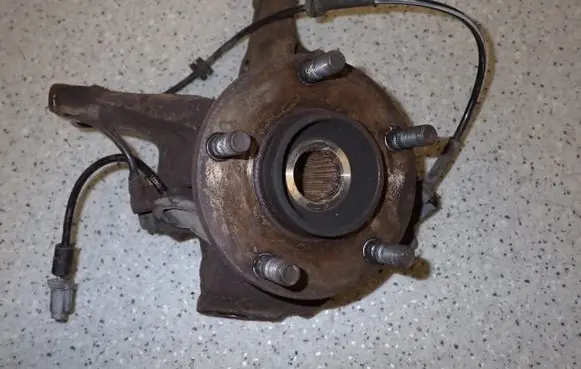 Nissan Almera Tino Front wheel hub spindle knuckle