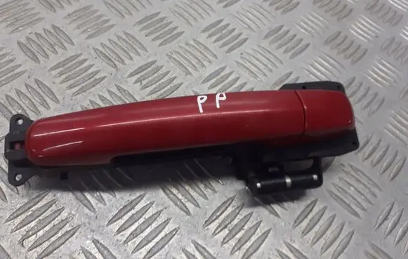 Suzuki Swift I Front door exterior handle/bracket 
