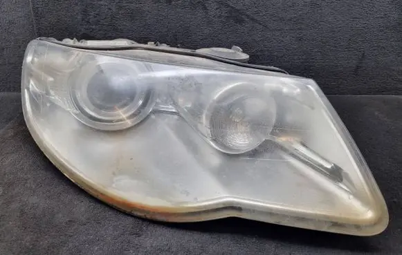 Volkswagen Touareg I Headlight/headlamp 7L6941032C