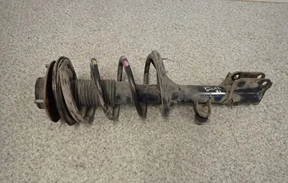 Hyundai Tucson JM Front shock absorber with coil spring