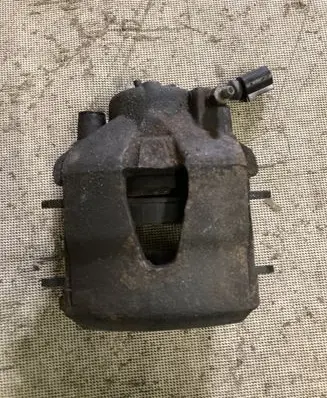 Volkswagen Golf VI Front brake caliper
