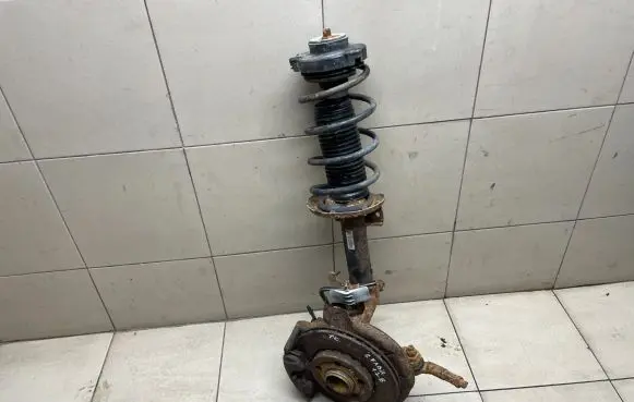 Front wheel hub spindle knuckle