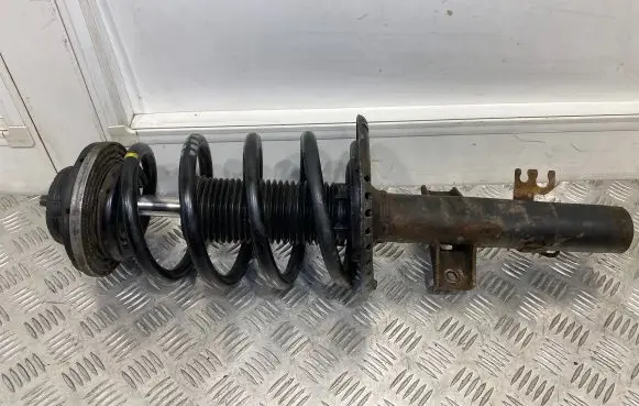 Volkswagen Transporter - Caravelle T5 Front shock absorber with coil spring 7H0413031N
