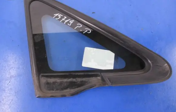 Suzuki Liana Front door vent window glass four-door 