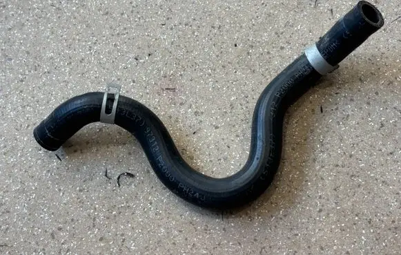 KIA Sorento IV Engine coolant pipe/hose 97312P2000