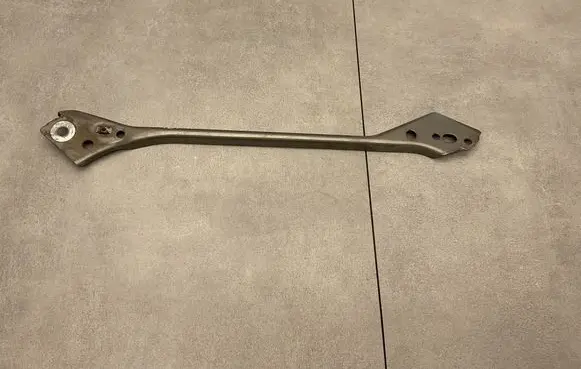 Radiator support slam panel bracket