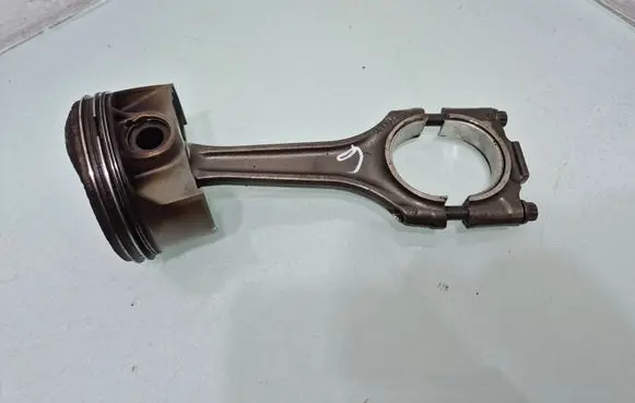 Piston with connecting rod