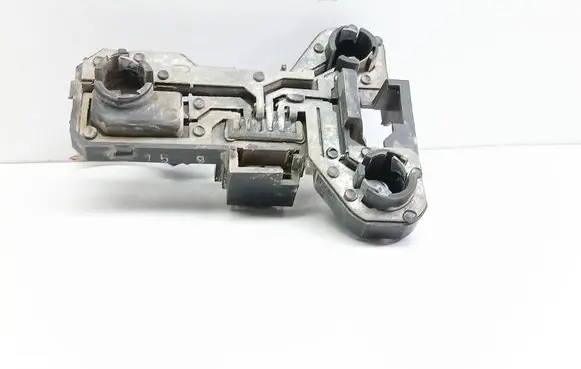 Tail light bulb cover holder