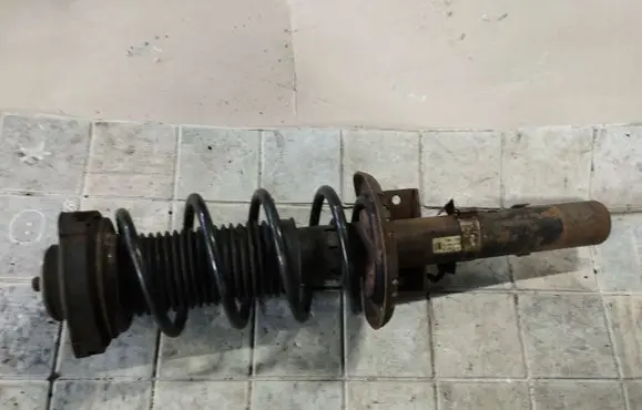 Audi A2 Front shock absorber with coil spring