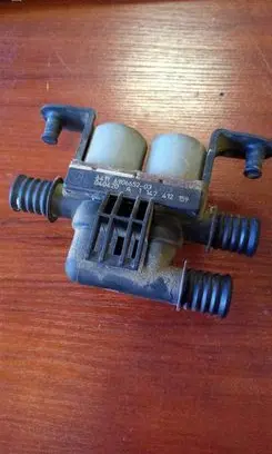 Coolant heater control valve