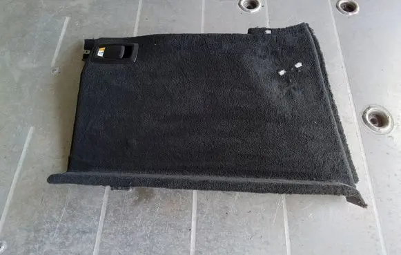 Trunk/boot lower side trim panel