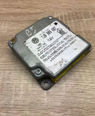 Volkswagen PASSAT B5 Airbag control unit/module 1J0909607 5WK4199