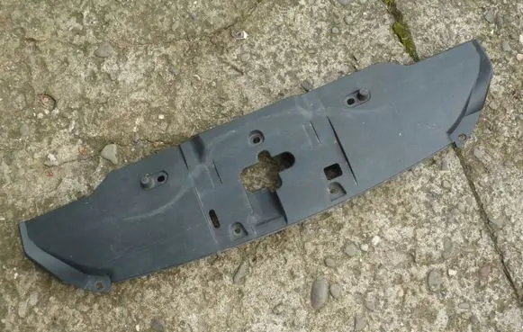 Engine bonnet/hood lock trim molding