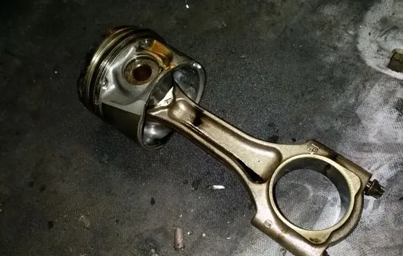 Opel Astra G Piston with connecting rod 84L42