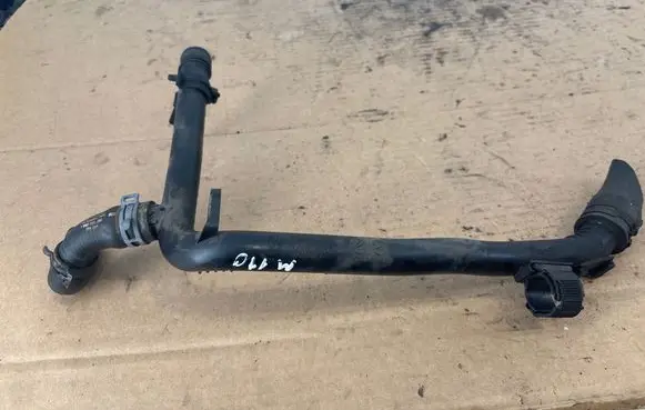 Volkswagen PASSAT CC Engine coolant pipe/hose 03L121065AJ