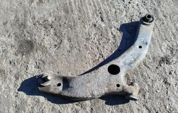 Mazda 323 Front lower control arm/wishbone