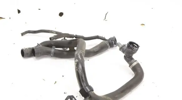Volkswagen Golf VIII Engine coolant pipe/hose 5Q0121049CQ