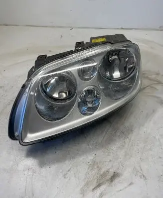 Volkswagen Touran I Headlight/headlamp 1T0941005S 0301205603