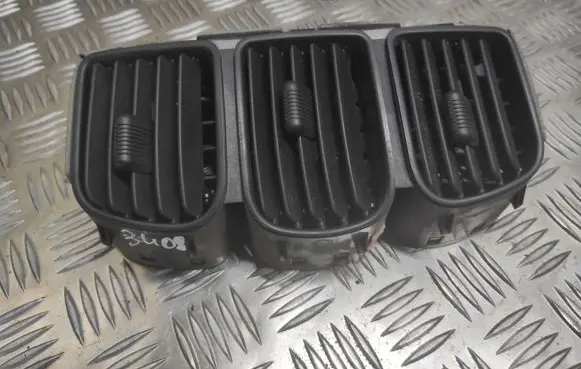 Dodge Caravan Dash center air vent grill 05005520AB