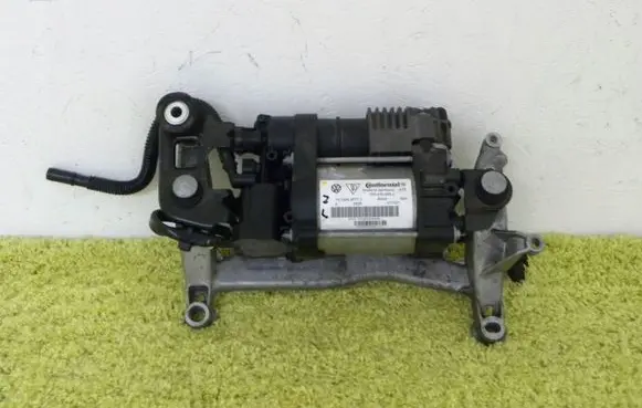 Volkswagen Touareg II Air suspension compressor/pump 7p0616006j