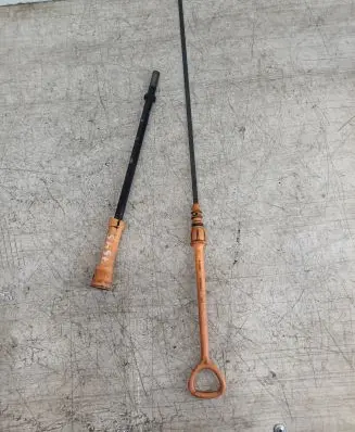 Oil level dip stick