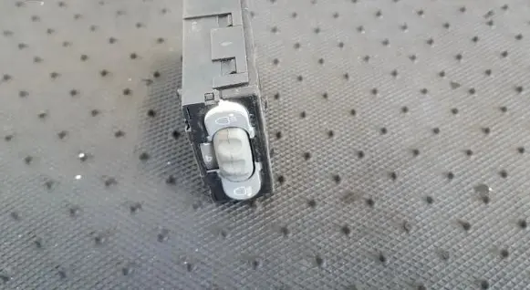 Headlight level height control switch