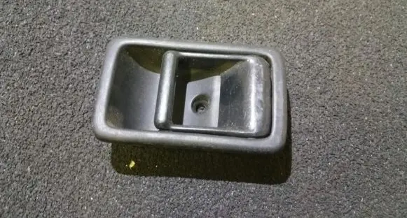 Mazda 323 Rear door interior handle