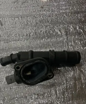 Thermostat/thermostat housing