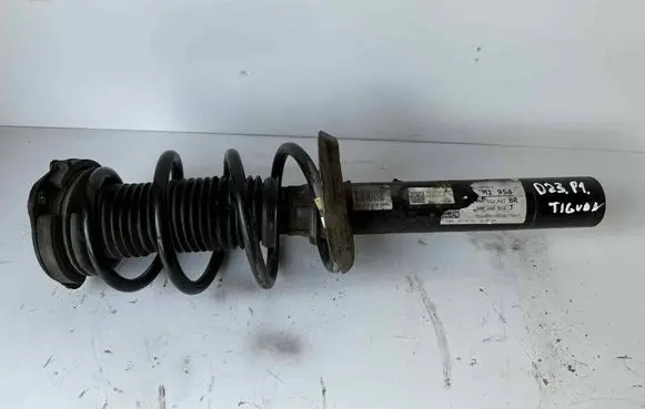 Volkswagen Tiguan Front shock absorber with coil spring 5N0413031AA