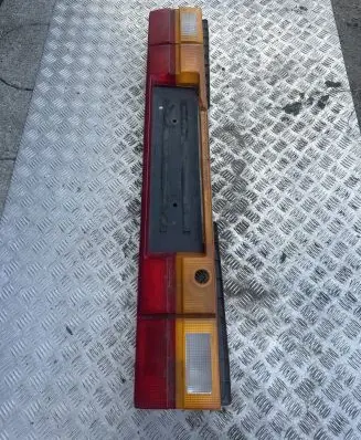 Audi 100 200 5000 C3 Rear light center trim bar blend 447945695J 130281