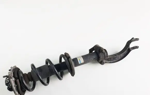 Front shock absorber with coil spring