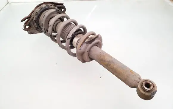 Nissan Almera N16 Rear shock absorber with coil spring 