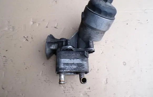Opel Combo A Oil filter mounting bracket 8973235441