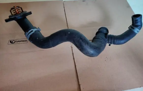Thermostat/thermostat housing