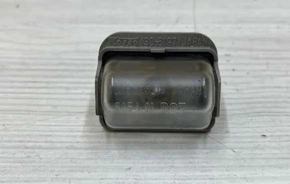 Mazda 6 Number plate light 13061971