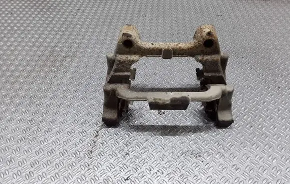 Volkswagen PASSAT B7 USA Brake caliper pad carrier rear 