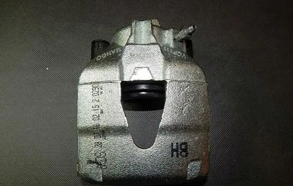 Volkswagen Polo V 6R Front brake caliper