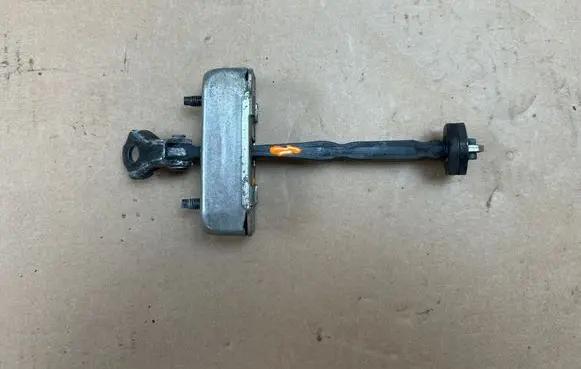 Toyota Avensis T270 Rear door check strap stopper