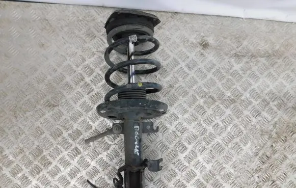 Renault Megane III Front shock absorber with coil spring