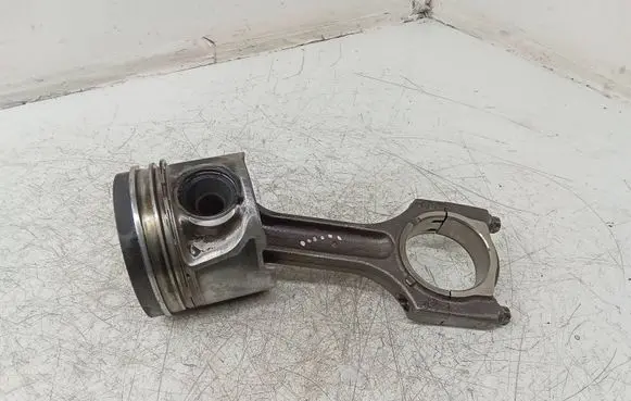Piston with connecting rod