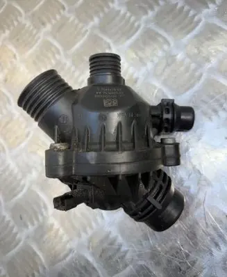 Thermostat/thermostat housing