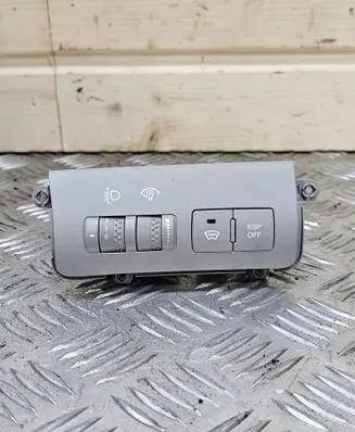 Headlight level height control switch
