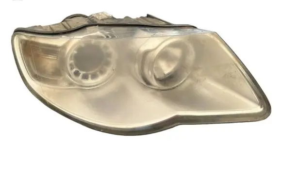 Volkswagen Touareg I Headlight/headlamp 7L6941032A 1LL24703204 24703204000099