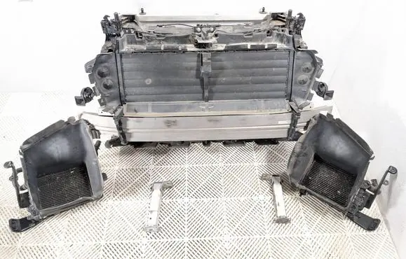 Radiator support slam panel