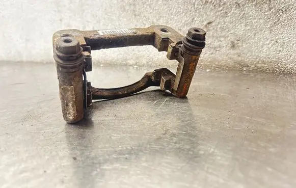 Opel Insignia A Brake caliper pad carrier rear 5902RH